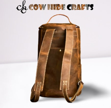 Tan leather backpack with top handle