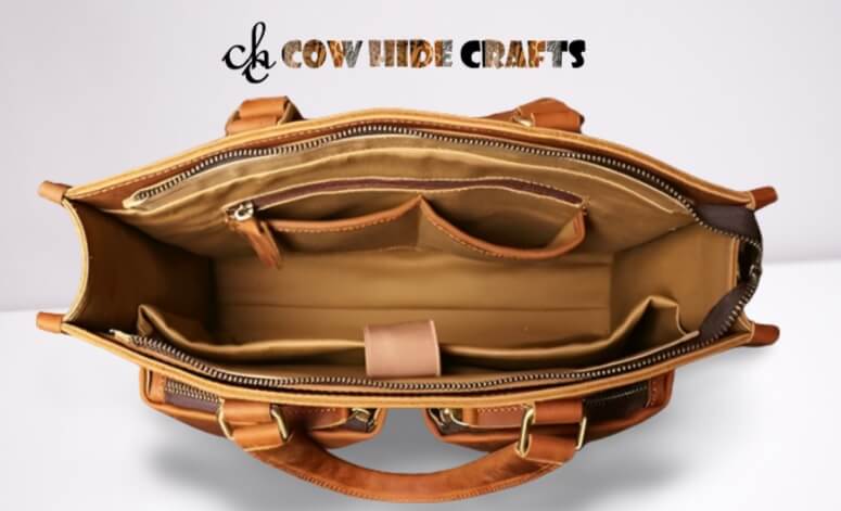 Tan leather satchel laptop sleeve inside