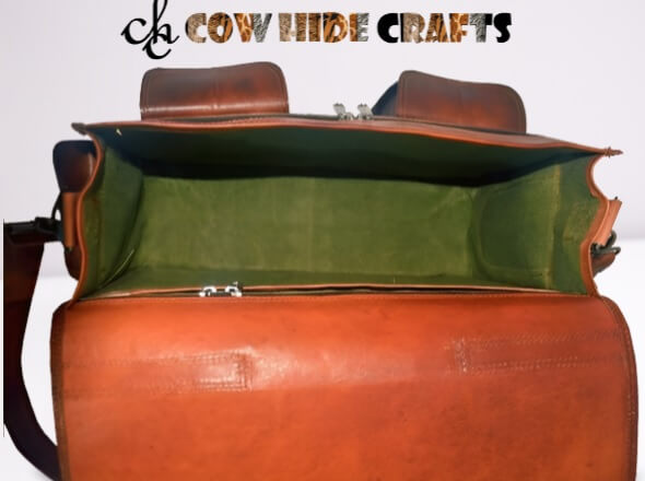 Tan leather satchel lined interior zipper