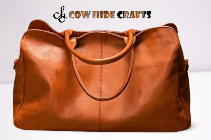 Handmade tan leather weekender travel bag