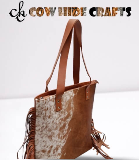 Tan white cowhide fringe bag dual leather handles