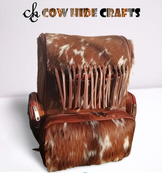 Tan white cowhide fringe bag front leather fringes