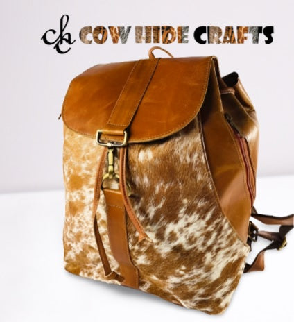 Tan and white cowhide leather rucksack backpack