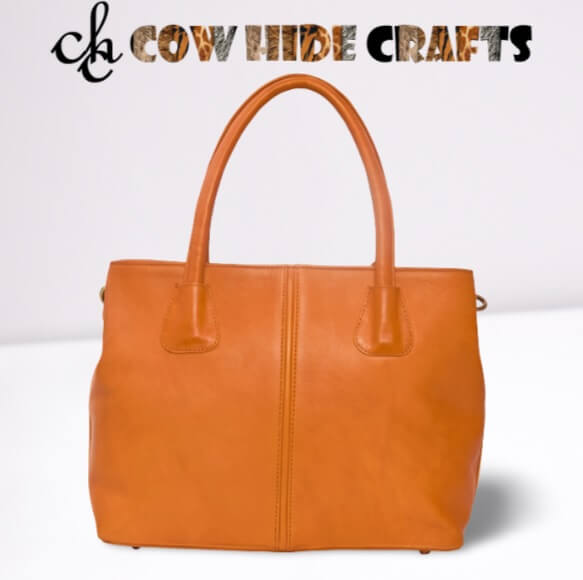 Tan white cowhide single side bag leather back