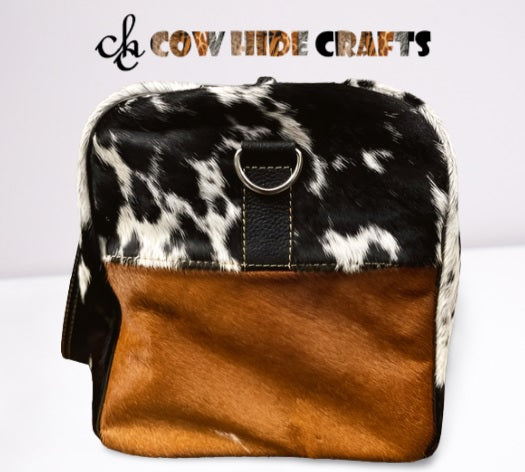 Mixed-tone side panel detail on tricolor cowhide duffle bag