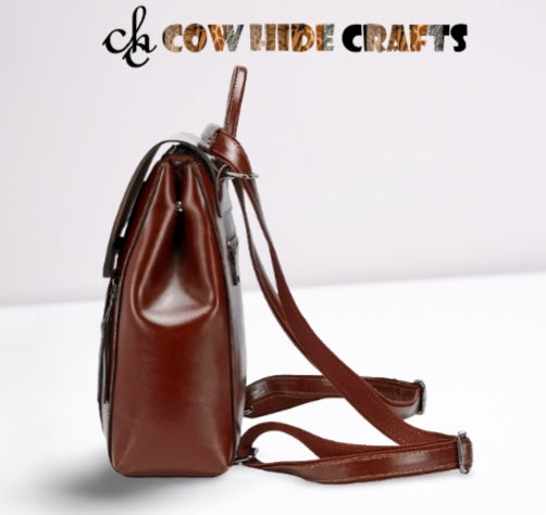 Two tone leather backpack flap closure
