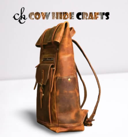 Unisex brown leather rucksack side view