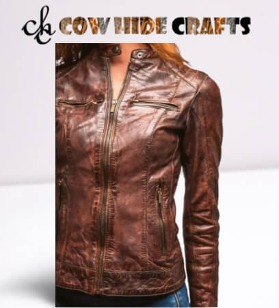 Waxed distressed texture detail on brown sheepskin jacket