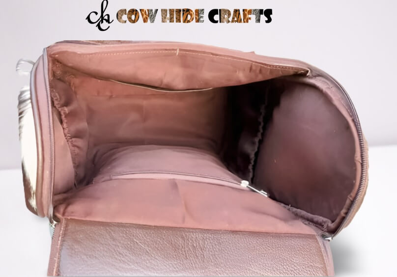 Western cowhide mommy backpack with diaper compartments