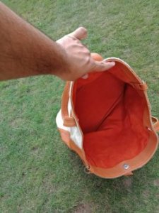 White cowhide bag natural unlined interior
