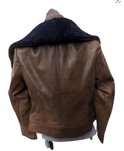 Women's shearling collar leather jacket styled for winter