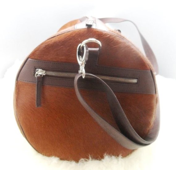 Side pocket leather duffle bag