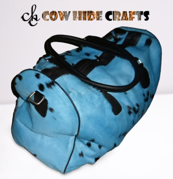 blue cowhide duffle bag