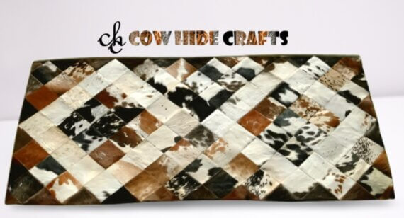 Antic Cowhide patch style large rugs.
